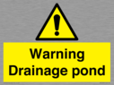 warning-drainage-pond~